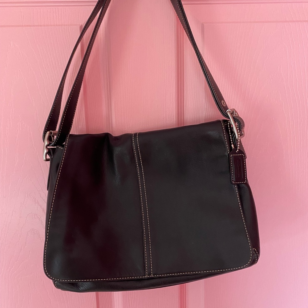 Coach black shoulder bag, adjustable strap.